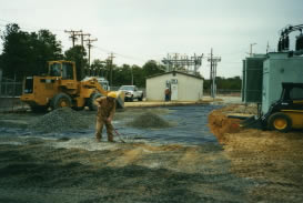 Distribution and finishing of top-off landscaping material to support the needs of this power substation