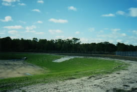 Finished turf on retention pond border resists erosion